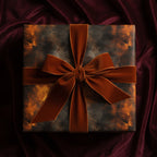 Elegant gift wrapped in abstract brown and black wrapping paper, finished with a velvet ribbon bow.