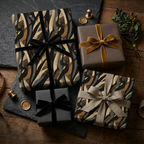 Elegant gifts wrapped in modern, abstract patterned paper with velvet ribbon accents.