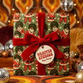 Funky Black Santa wrapping paper by Wrapped Studios with red velvet bow in retro 70s holiday setting.