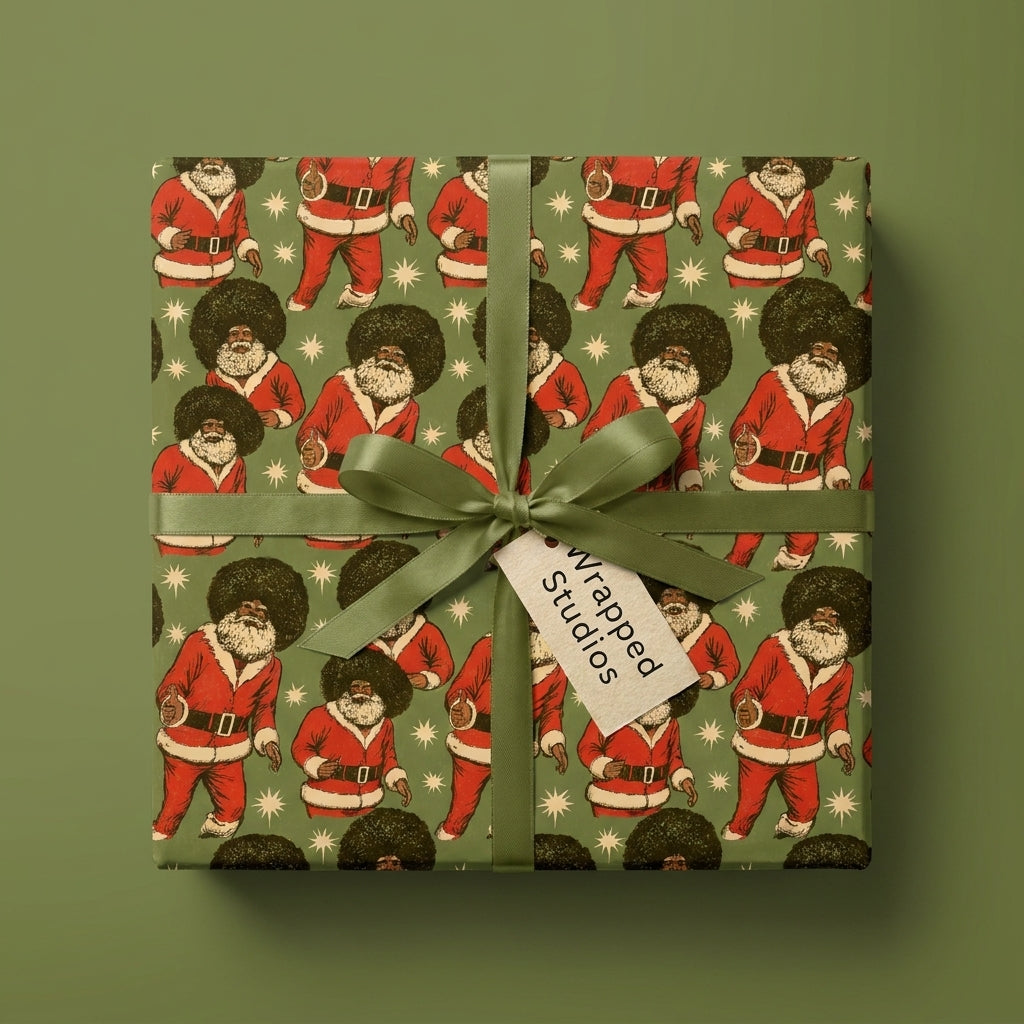 Black Santa wrapping paper with retro afro pattern and green ribbon by Wrapped Studios.