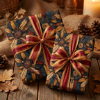 Rustic autumn gift wrap featuring a feathered floral pattern and red/gold ribbon, perfect for Thanksgiving or fall birthdays.