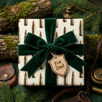 Bullet pattern hunting gift wrap with green velvet bow for Father's Day, by Wrapped Studios.