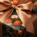 Luxury autumn floral wrapping paper with pumpkins and a copper satin bow by Wrapped Studios.