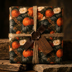 Rustic pumpkin wrapping paper by Wrapped Studios on a fall gift box with twine and wax seal.