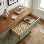 Vintage floral wrapping paper used as a rustic drawer liner by Wrapped Studios.