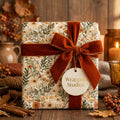 Vintage floral wrapping paper with rust velvet bow by Wrapped Studios in a cozy fall setting.