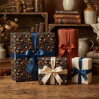 Moody vintage floral wrapping paper and terracotta gift wrap with satin bows by Wrapped Studios.