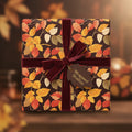 Autumnal floral wrapping paper with a velvet burgundy ribbon and gift tag.