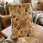 Wrapped Studios autumn floral gift wrap. Earthy tones, rustic twine, and botanical print.