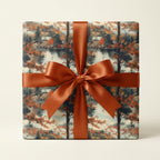Square gift wrapped in autumn landscape wrapping paper with a copper-colored satin ribbon.