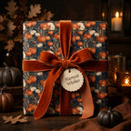 Rustic pumpkin wrapping paper with terracotta velvet ribbon and harvest tag by Wrapped Studios.