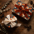 Rustic pumpkin fall wrapping paper with luxury velvet ribbon on autumn gift boxes by Wrapped Studios.