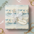 Nautical gift wrap featuring sailboats and roses, tied with a sheer ribbon bow for a special occasion.