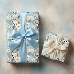 Baby shower wrapping paper, with teddy bears and white flowers on blue, Wrapped Studios.