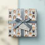 Gift wrapped in First Communion wrapping paper, featuring a grey ribbon and a tag that says "A Holy Gift".