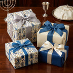Hanukkah wrapping paper with traditional Jewish holiday patterns and luxury ribbons by Wrapped Studios.
