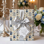 Bar Mitzvah wrapping paper with silver satin bow and gift tag on elegant table by Wrapped Studios.