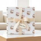 Baseball gift wrap with cream ribbon and "Home Run!" tag, perfect for sports fans.