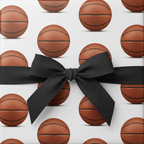 Basketball wrapping paper with a black ribbon bow, perfect for a sporty birthday gift.