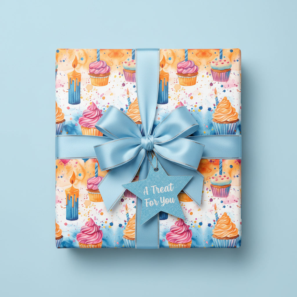 Square gift wrapped in watercolor cupcake birthday wrapping paper with a light blue satin ribbon and star tag.