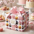 Square gift wrapped in cupcake-patterned birthday wrapping paper with a pink ribbon and "Sweet Wishes" tag.
