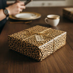 Leopard print gift wrapped in twine, a trendy gift wrap for birthdays or special occasions.