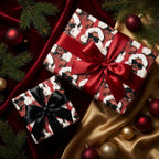 Luxury Black Santa wrapping paper on Christmas gift boxes with satin bows, by Wrapped Studios.