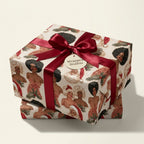 Vintage Christmas wrapping paper with retro glam holiday illustrations and red bow, by Wrapped Studios.