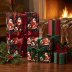 Black Santa Christmas wrapping paper with luxury velvet ribbons by a fireplace, from Wrapped Studios.