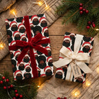 Black Santa Christmas wrapping paper on holiday gifts with red velvet ribbon by Wrapped Studios.