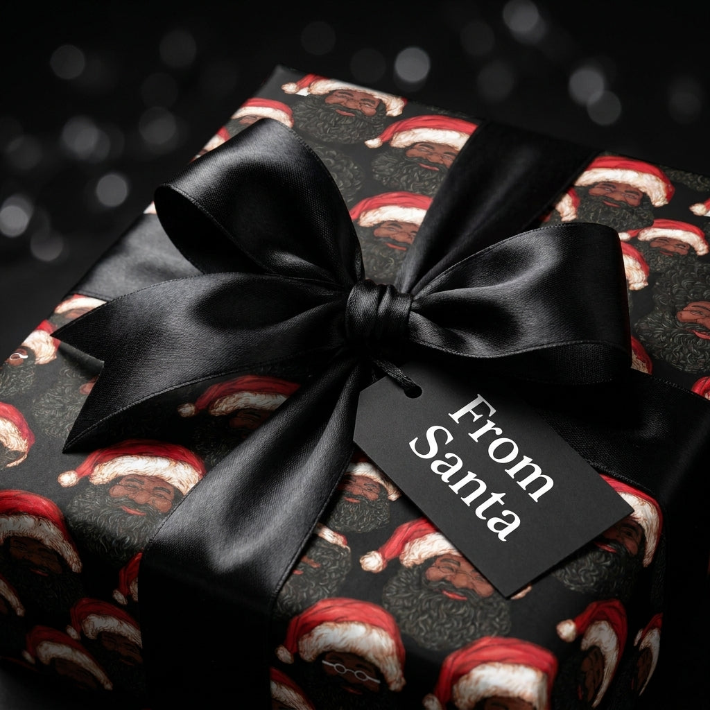 Black Santa Christmas wrapping paper on a gift with a black satin bow and From Santa tag by Wrapped Studios.