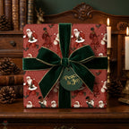 Vintage Black Santa wrapping paper with a green velvet bow, luxury Christmas gift wrap by Wrapped Studios.