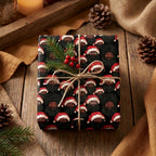 Black Santa wrapping paper on a rustic Christmas gift box with twine by Wrapped Studios.