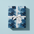 Abstract blue and white gift wrap with white ribbon, perfect for luxury gift packaging.