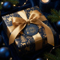 Luxury navy and gold Christmas wrapping paper with a Nativity pattern by Wrapped Studios.