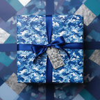 Square gift wrapped in blue camo wrapping paper with a matching ribbon and "For My True Blue" tag.