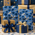 Blue and gold graduation wrapping paper with caps and diplomas on gift boxes by Wrapped Studios.