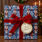 Luxury blue nutcracker Christmas wrapping paper with a red velvet bow by Wrapped Studios.