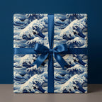 Blue wave pattern gift box wrapped in satin ribbon; unique, artistic gift wrapping paper.