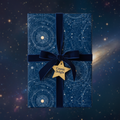 Navy constellation wrapping paper with velvet ribbon and star tag, perfect for unique gifts.