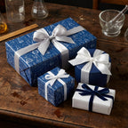 Navy blue science wrapping paper with chemistry beaker prints and satin bows by Wrapped Studios.