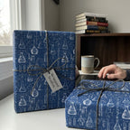 Science wrapping paper with blueprint chemistry beaker design on gifts by Wrapped Studios.