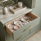 Modern pink botanical wrapping paper used as an elegant vanity drawer liner by Wrapped Studios.