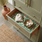 Pink and green eucalyptus wrapping paper used as a decorative drawer liner by Wrapped Studios.