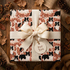 Border collie dog wrapping paper by Wrapped Studios with a cream bow on a rustic autumn background.