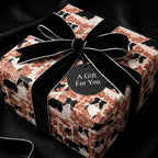 Luxury Border Collie dog wrapping paper with a black velvet bow on a gift box by Wrapped Studios.