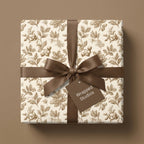 Elegant vintage floral wrapping paper with brown satin ribbon and gift tag by Wrapped Studios.