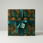 Elegant gift box wrapped in modern green and gold wrapping paper with a teal satin ribbon and bow.