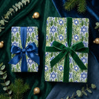 Luxury botanical Hanukkah wrapping paper with Star of David print and elegant bows by Wrapped Studios.