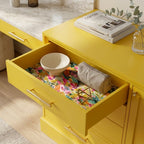 Colorful floral wrapping paper used as a modern drawer liner in a yellow cabinet by Wrapped Studios.